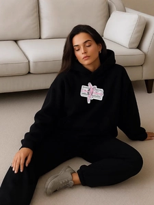 Men's black oversized hoodie and jogger set with bill and pink ribbon print