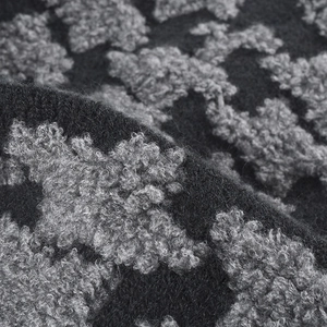 Women's knit beanie with gray jacquard pattern and thick bouclé texture for winter