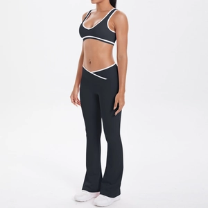 Detail of high-waist yoga set featuring contrast piping and V-shape crossover waistband