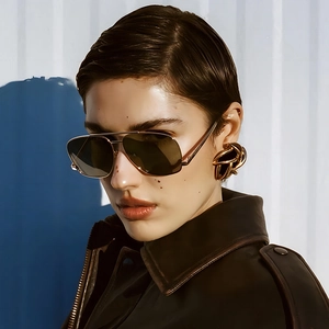 Classic gold aviator sunglasses with dark polarized lenses and high-fashion metal frame