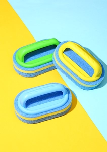 Three multi-colored cleaning sponge brushes with plastic handles for kitchen and bathroom use