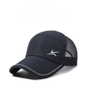 Detail view of breathable mesh fabric and reflective trim on navy sport baseball cap