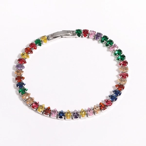 Close-up of 18K gold-plated bracelet with multi-color pear-cut zircon stones and fold-over clasp