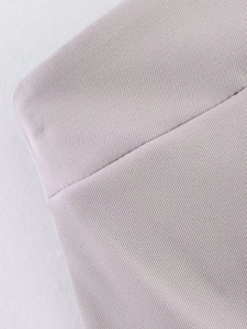 Close-up detail of light purple twill fabric showing fine stitching and textile texture