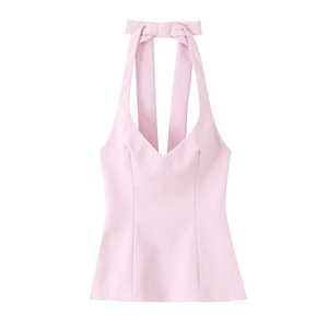 Sultry pink halter top for women featuring a stylish back bow detail on a plain background