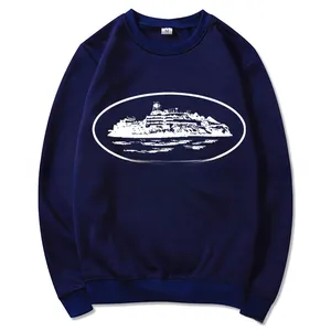Detail of navy blue sweatshirt featuring a white oval graphic print and size M label