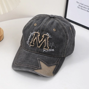 Vintage washed dark grey baseball cap with M embroidery and star patch in street style