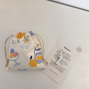 Small canvas drawstring storage bag with colorful ice-cream prints and wireless earbuds