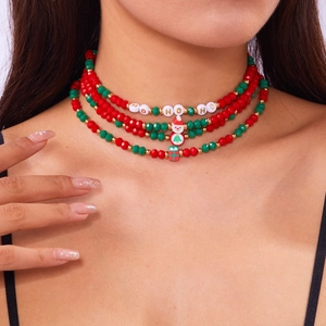 Multi-layer Christmas beaded necklace with Santa charms and 'HO HO HO' letter beads
