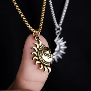 Minimalist sun and moon pendant necklace in gold and silver finish with box chain