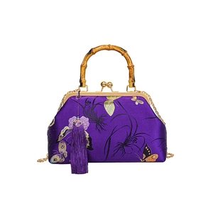 Elegant purple silk handbag with butterfly embroidery and bamboo handle for women