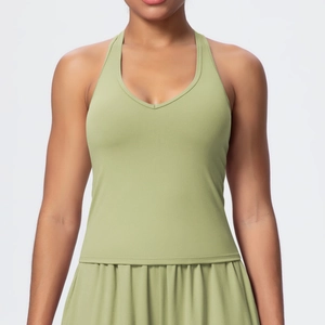 Close-up of the V-neck design and soft brushed fabric on this green yoga sports bra