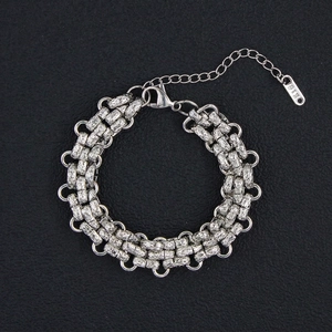 Silver woven titanium steel bracelet with industrial cylinder links and K18 tag