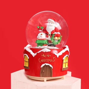 Christmas snow globe music box featuring Santa Claus and snowman with 'Merry Christmas' text