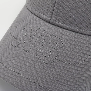 Close-up of grey baseball cap with LVS embroidery and breathable mesh texture