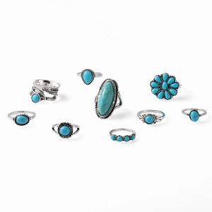 Vintage bohemian 9-piece ring set with turquoise stones and silver feather carvings