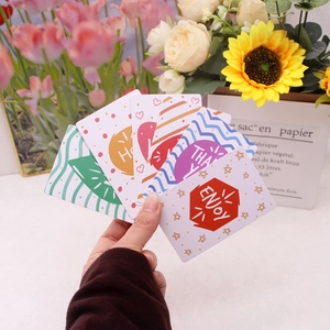 Colorful floral gift cards with Hello and Thank You text held against a sunflower bouquet