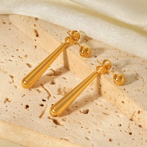 Minimalist 18K gold-plated stainless steel teardrop earrings with round ball studs on silk