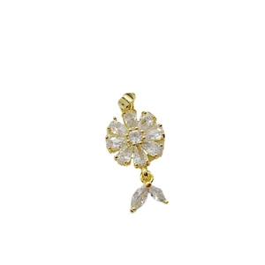 Elegant gold flower pendant with leaf drops and sparkling white cubic zirconia stones