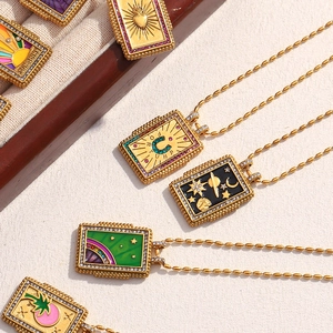Collection of 18K gold plated square tarot pendants with enamel and gemstones detail