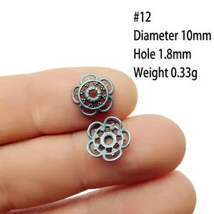 Close-up of 10mm flower spacer bead in gunmetal alloy for DIY jewelry crafting