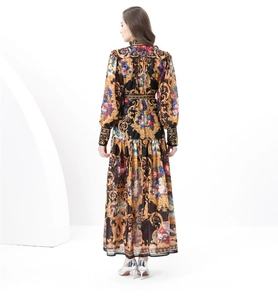 Rear view of Baroque print maxi dress featuring vintage patterns and a cinched waist