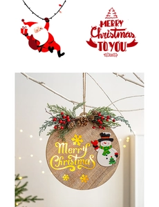Detail of wooden Merry Christmas door sign with pine needles and snowman ornament