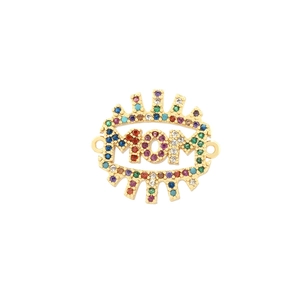 Macro view of gold MOM charm with colorful gemstones and side connecting rings