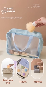 Detailed view of four colorful silicone travel bottles in a waterproof frosted storage bag