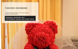 Close-up of red rose bear with silver crown and bridal veil for Valentine gift