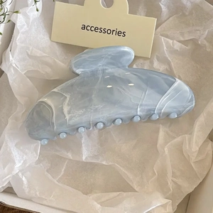 Minimalist marble pattern shark hair clip in light blue for elegant hair styling