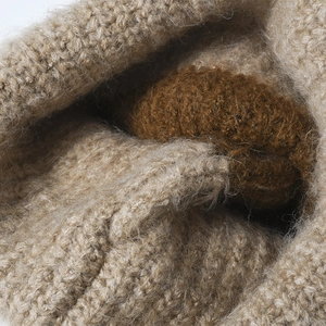 Thick wool knit beanie for winter featuring warm dual-layer fleece lining and texture