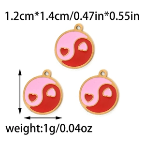 Detail view of 1.2x1.4cm stainless steel pink and red yin-yang heart charms with weight data