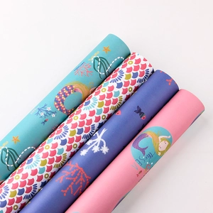 Mermaid theme wrapping paper rolls with tiffany blue and coral fish scale patterns