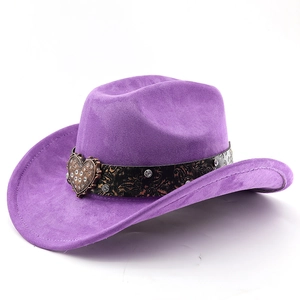 Detail of purple suede cowboy hat featuring a heart-shaped rhinestone buckle and decorative band