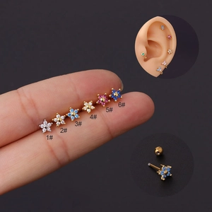 Detail of six colorful floral stud earrings with screw ball backs in stainless steel