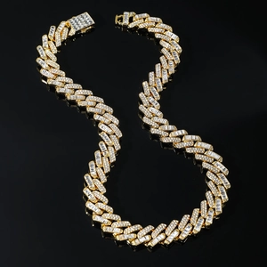 Luxurious 15mm gold Cuban link necklace with iced out crystals on black background