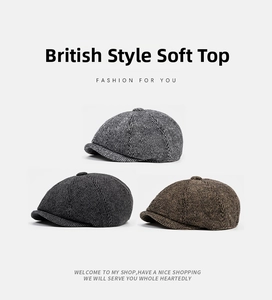 Detailed texture of herringbone newsboy caps in grey and brown wool blend fabrics