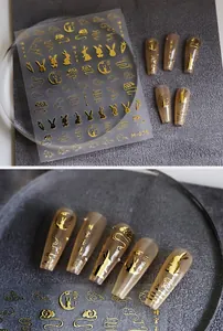 Macro detail of M-075 golden 3D relief nail stickers with rabbit and cloud patterns