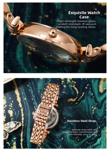 Detail of luxury rose gold steel watch with mineral glass lens and butterfly accessory