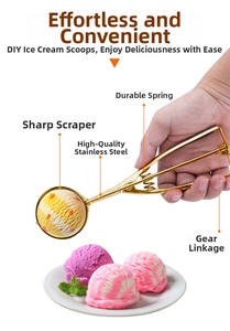Detail view of gold stainless steel ice cream scoop with gear spring and scraper