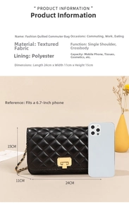 Detail of black quilted leather shoulder bag with gold twist lock and metal chain strap