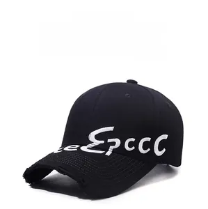 Detail of distressed brim and vintage letter embroidery on this black cotton baseball cap