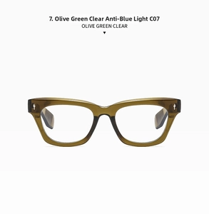 Detail view of olive green cat-eye glasses frame with metal rivets and anti-blue light lens