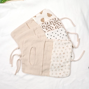 Four-pack cotton baby stroller organizers in bear, leopard, polka dot and floral prints