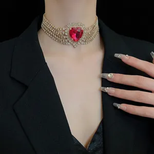 Luxurious 5-row rhinestone choker featuring a large ruby-red heart pendant for women