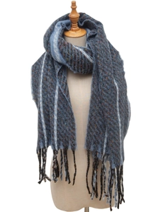 Close-up of blue striped knit scarf with colorful flecks and dark fringe on a mannequin