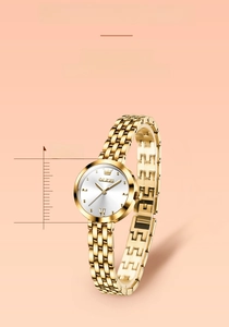 Macro detail of a 25mm vintage gold watch face with roman numerals and five-link band