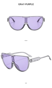Detail view of semi-round shield sunglasses with gray frames and purple lenses