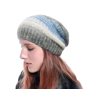 Women's warm winter knitted beanie with blue and grey gradient tie-dye pattern